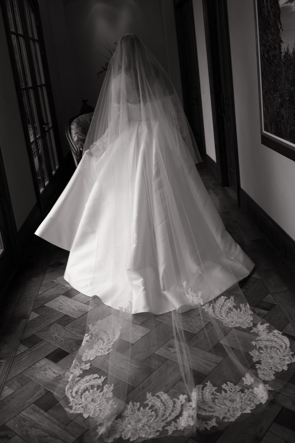 Black and white bridal portrait of Lauren in her veil