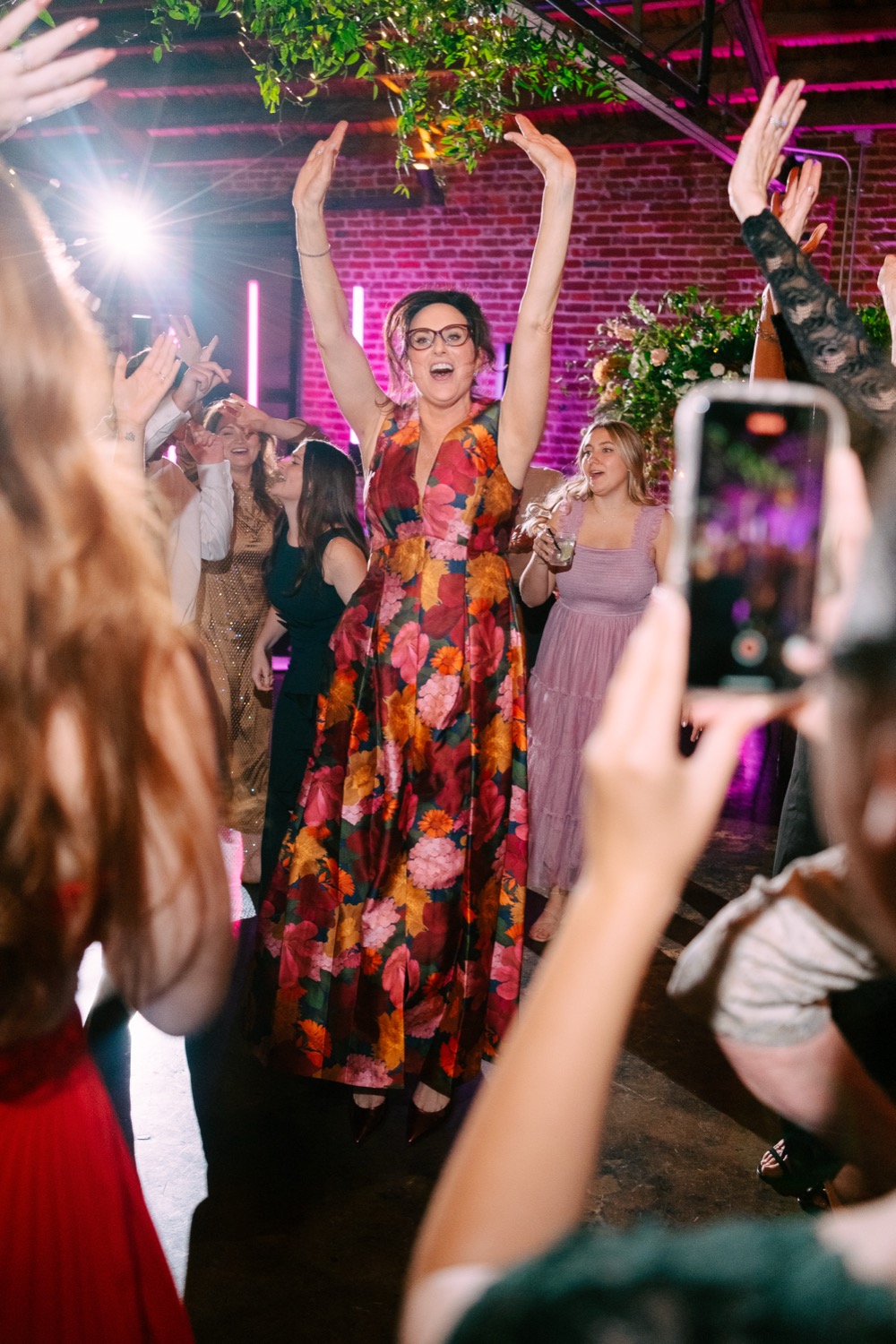 Wedding guest dancing at Lauren and Logan's reception