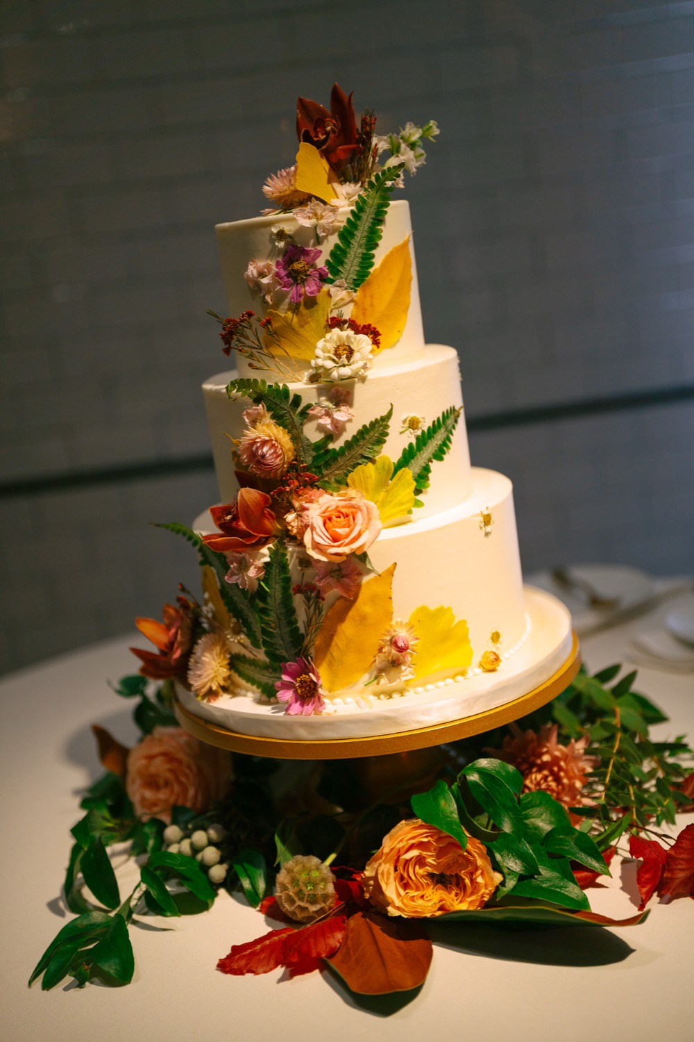 Lauren and Logan's floral wedding cake at The Guild